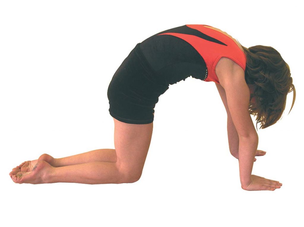 A child in the angry cat position